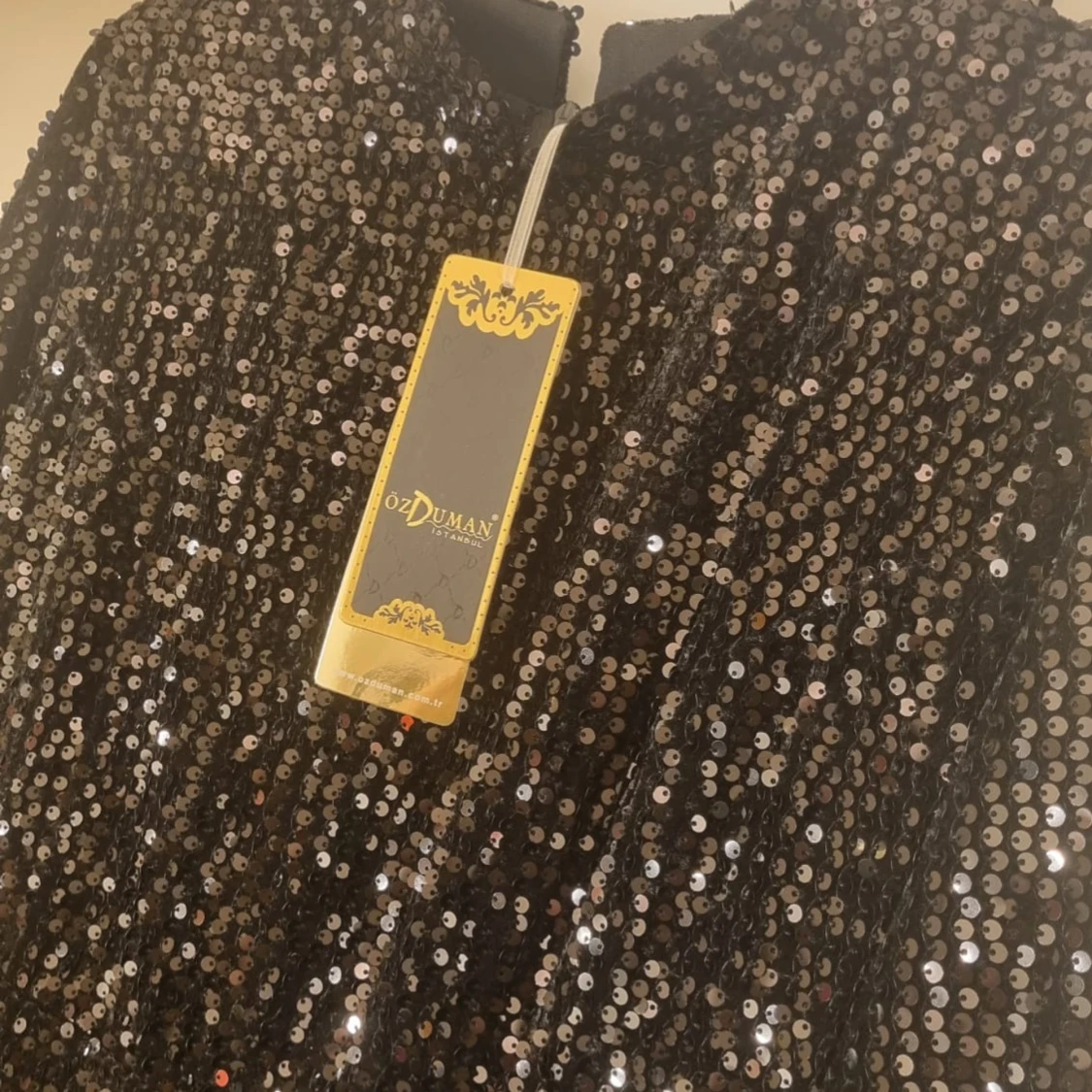 Svart glittrig klänning  - 2