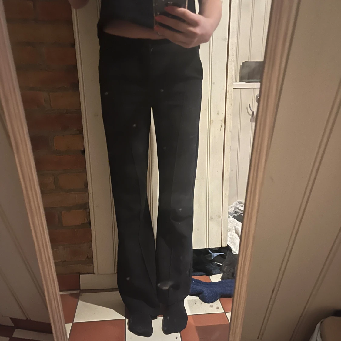 Svarta kostymbyxor