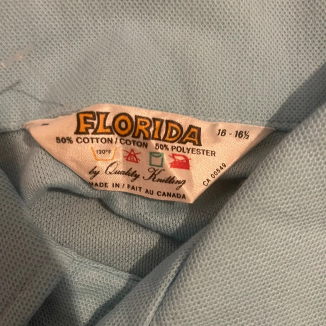 Ljusblå pikétröja  - 2