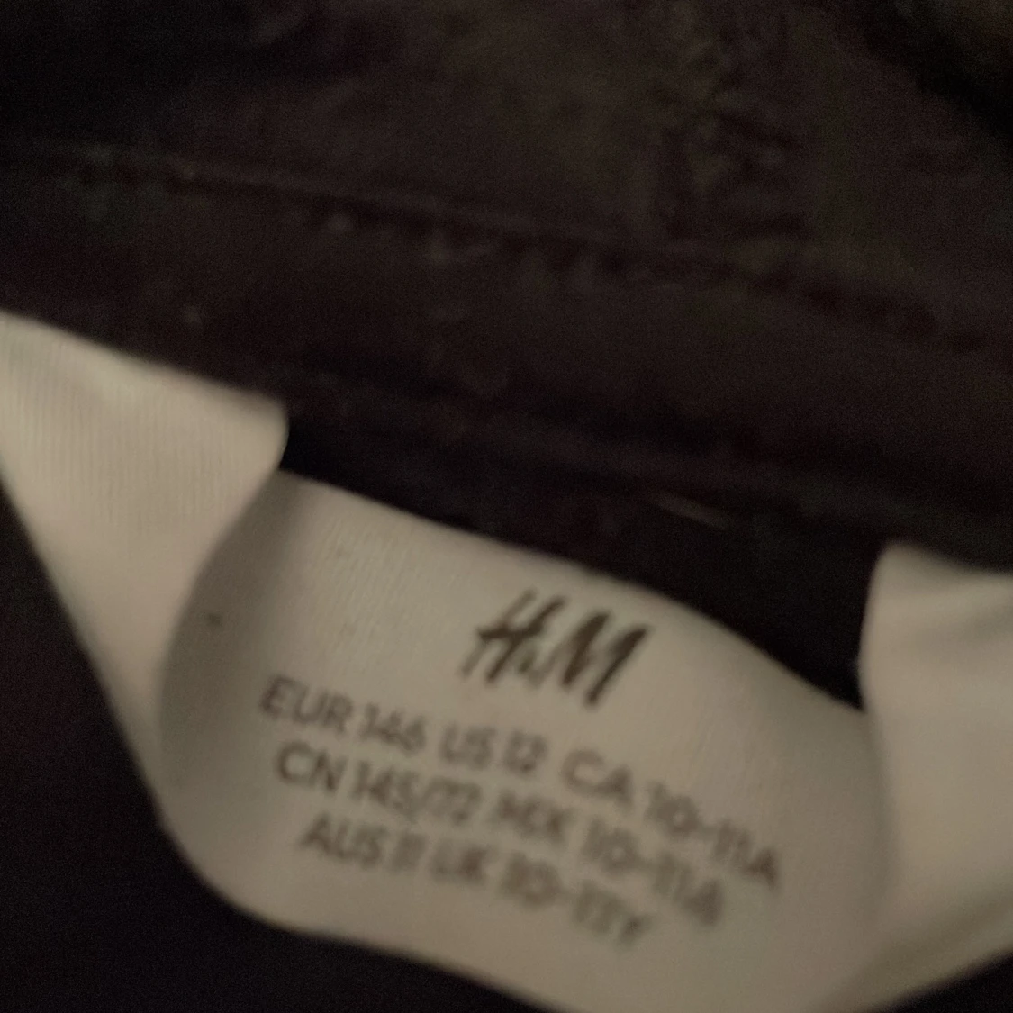 Svart hoodie från H&M - 90