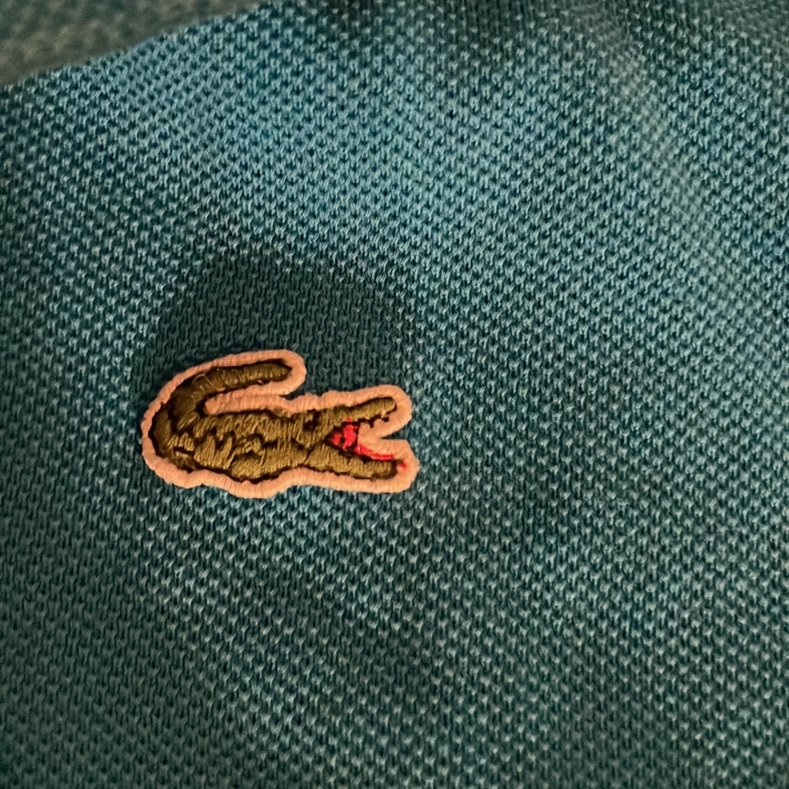 Blå pikétröja från Lacoste - 92