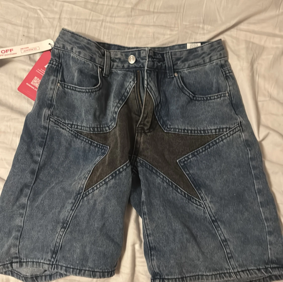 Blå jeansshorts med stjärndetalj - 90