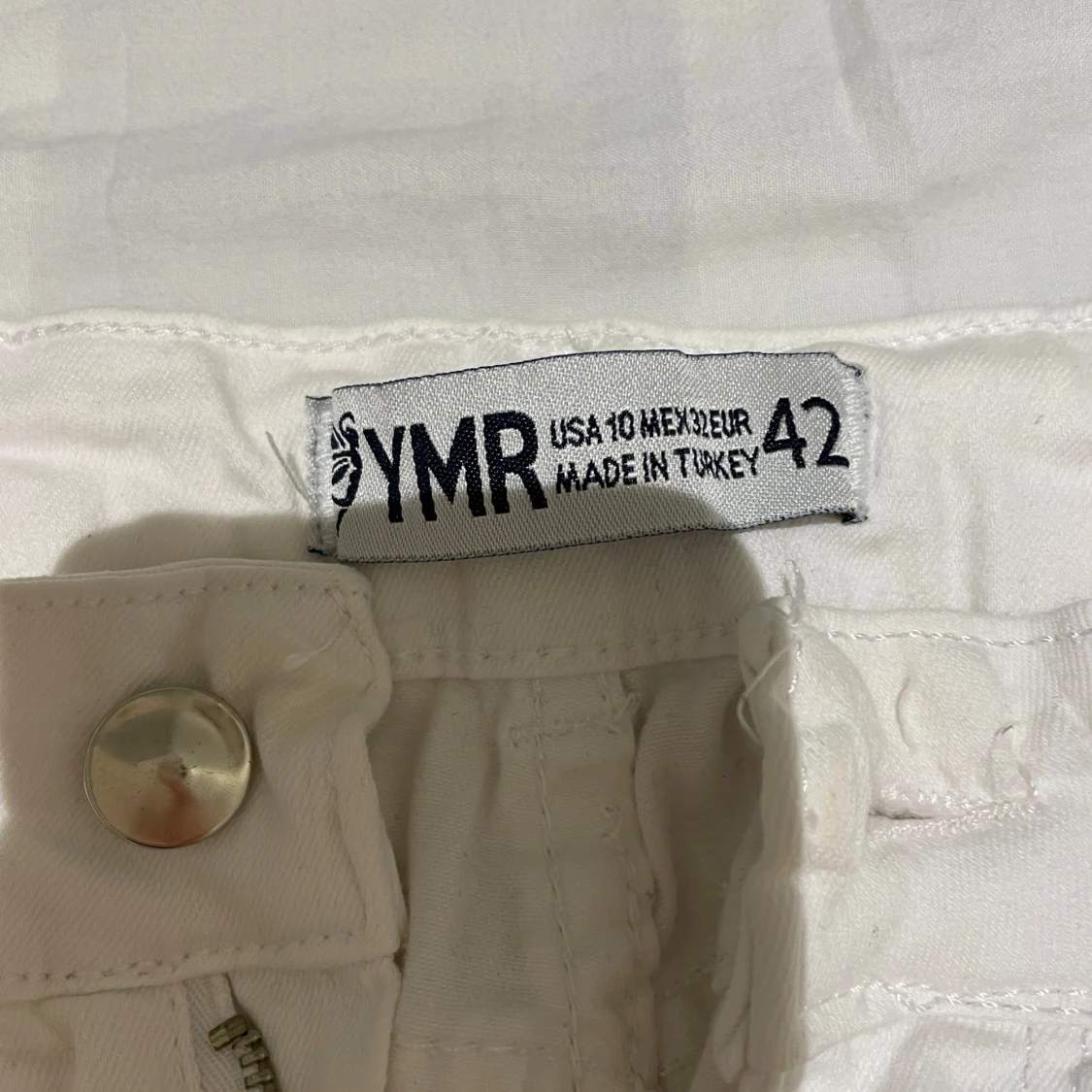 Vita jeansbyxor från YMR - 92