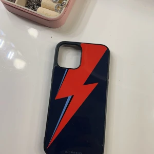 Bjornberry skal - Bjornberry skal, mörkblå med röd blixt 