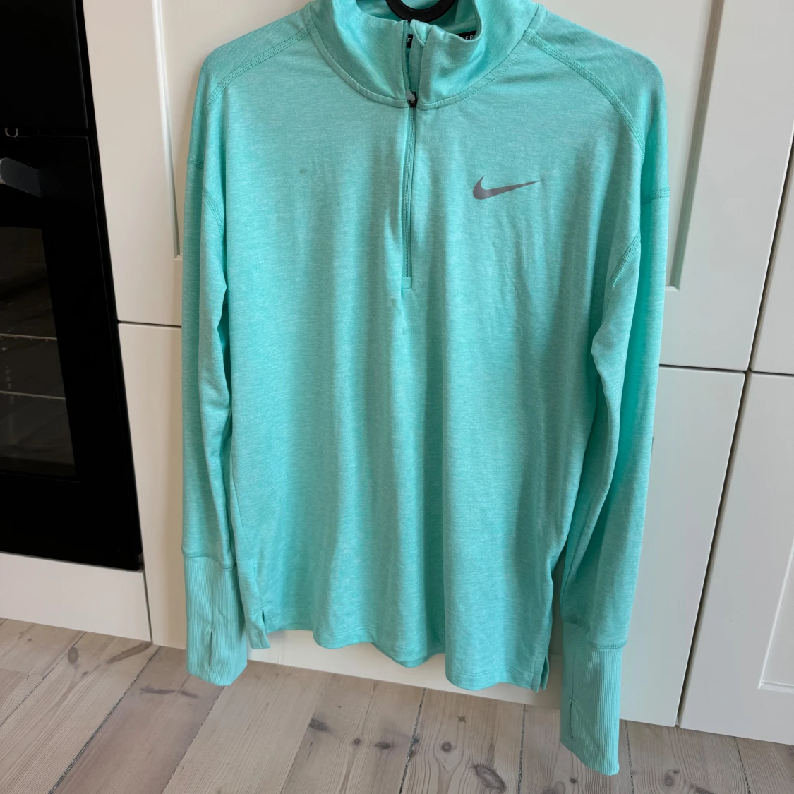 Turkos träningströja från Nike - 90