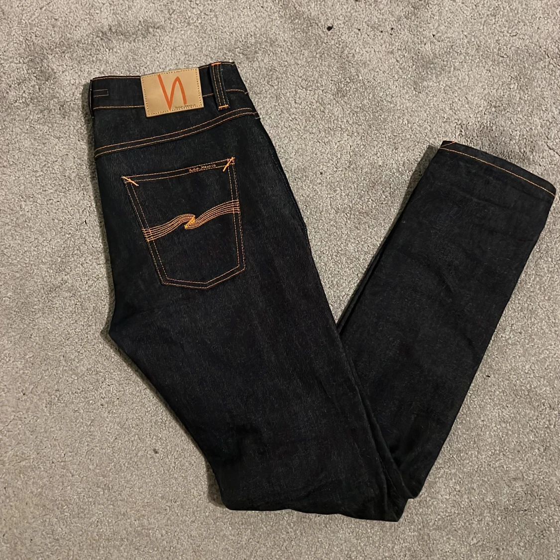 Mörkblå jeans från Nudie slim W29
