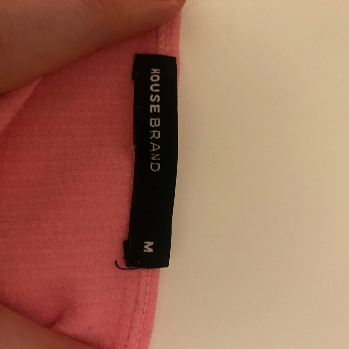 Rosa ribbad linnetopp från House Brand - 91