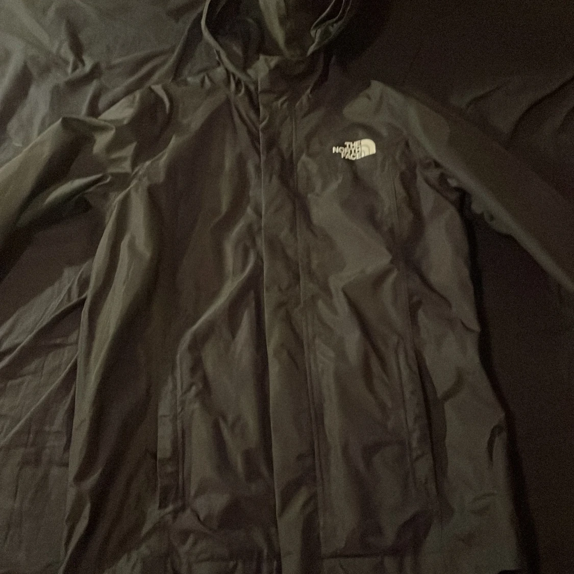 Svart regnjacka från The North Face