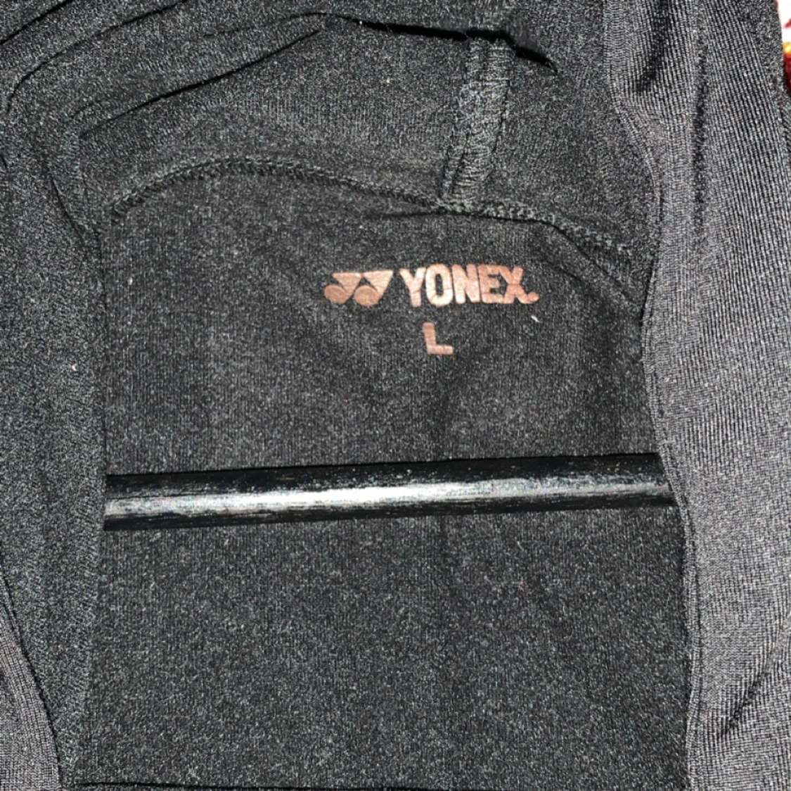Svart hoodie från Yonex - 91