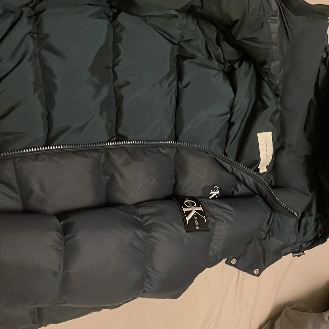 Blå dunjacka från Calvin Klein - 91