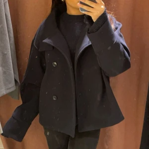 Kappa - En kappa från Gina tricket som är försiktigt använd