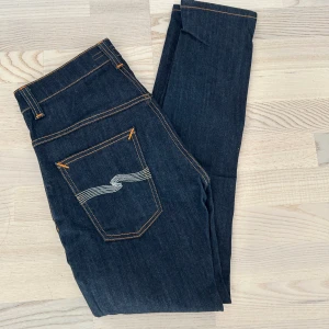 Nudie Jeans - Nudie Jeans av modellen Thin Finn | Storlek: 30/30 - Skicket på jeansen är Mycket bra utan defekter - skulle säga den är nästan Ny utan Prislapp! - Mitt pris: 545 - Nypris: 1599kr