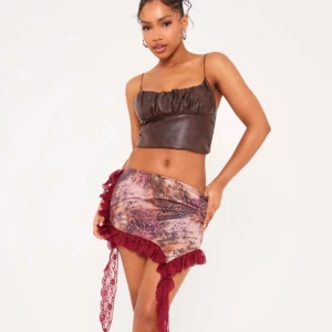 Vinröd leopard print kjol - Oanvänd kjol i storlek uk 8 som motsvarar s/m med dragkedja 