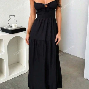 Lång klänning  - Jätte fin oanvänd klänning med öppen rygg Stl xs/s Köparen står för frakten 