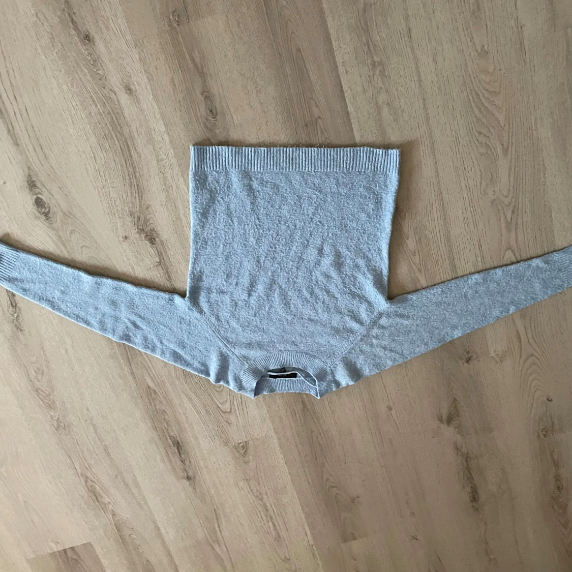 Ljusblå stickad tröja