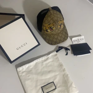 Gucci keps Tiger -  Har använt den den här sommaren bara Kvitto kommer med box och dust bagg pris kan diskuteras