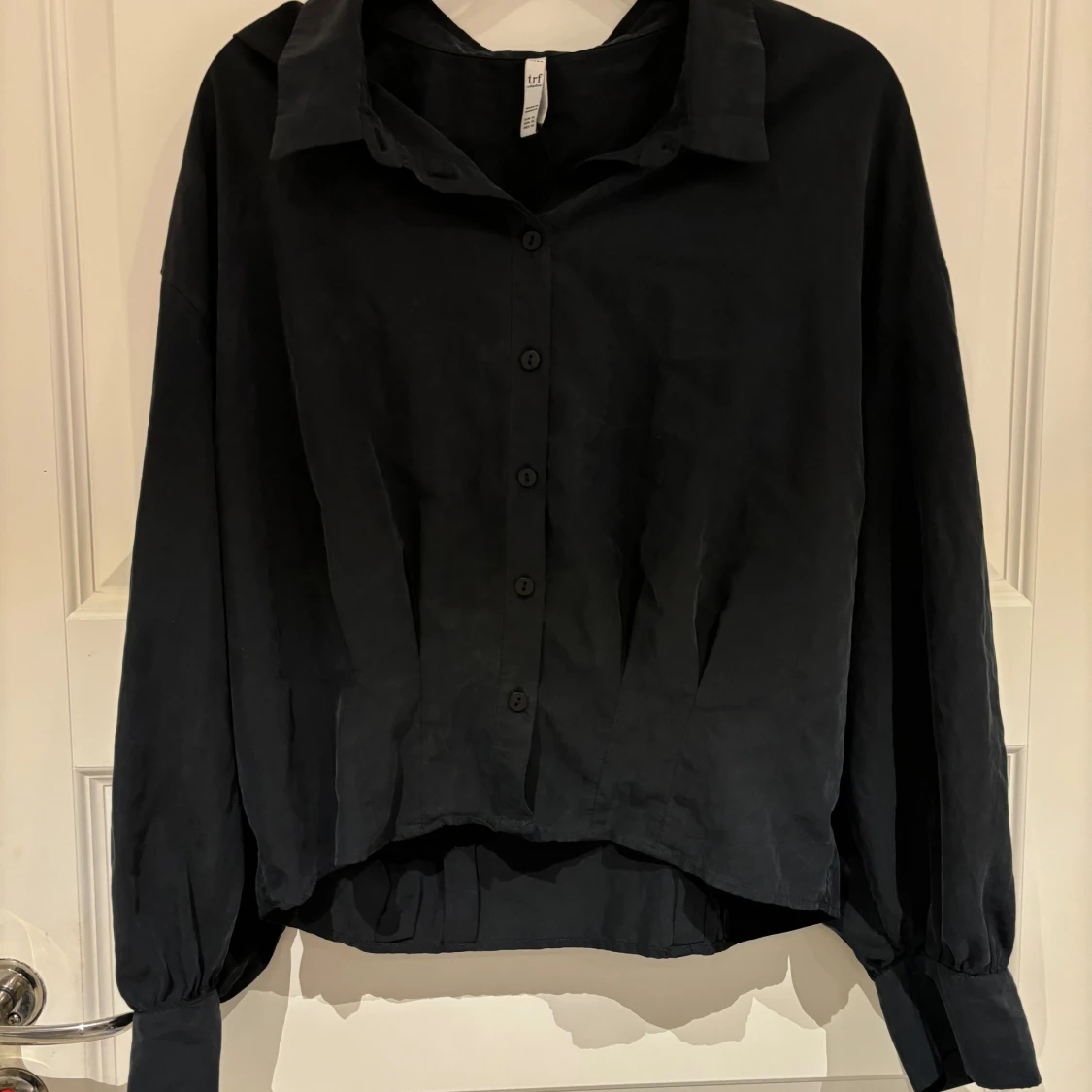 Oversized skjorta i mocka-aktigt material 