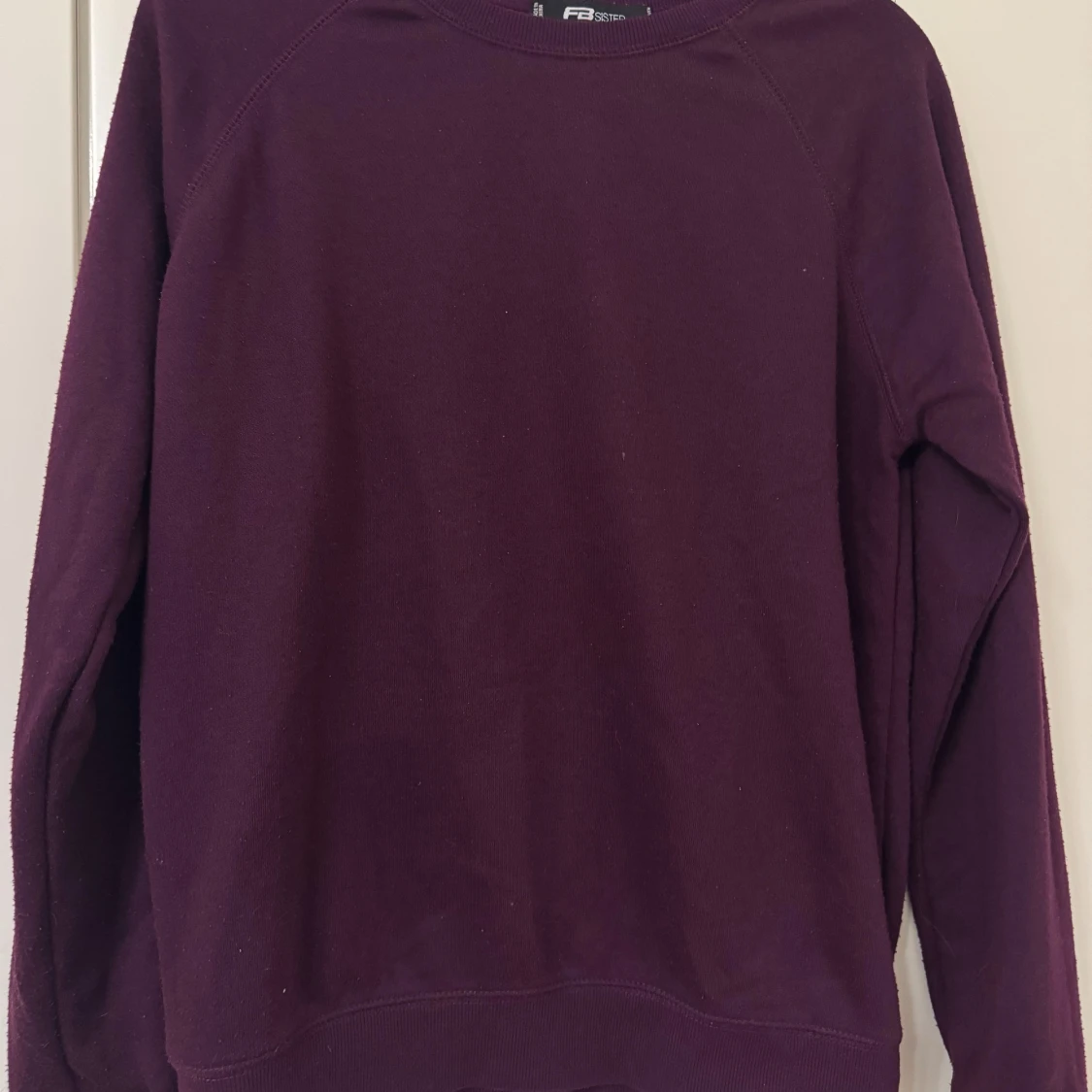 Mörklila tröja 