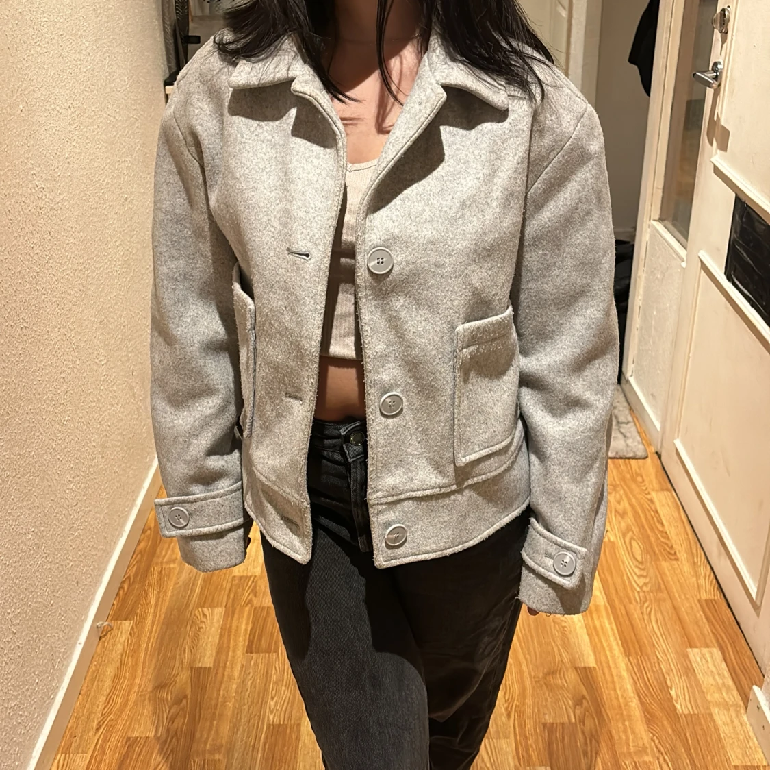 Grå kappa från 157