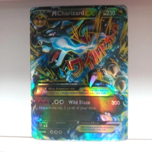 Mega Carizard EX  - Bra skick har aldrig riktigt tagit fram den, äkta och rare. Pris kan diskuteras 