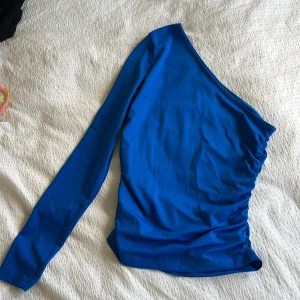 Enarmad topp - Enarmad topp från gina. Superfin till hösten. Storlek S