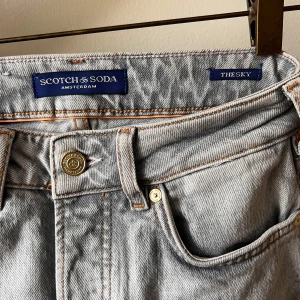 Scotch&Soda the sky jeans  - Size is 25/32, used 2 times. From their pre-spring 23 collection.   Description: The Sky has a straight leg fit that sits high on the waist and ends just above the ankle. Washed in a light-blue tone with button details. 