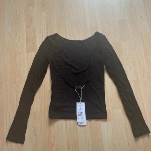 tröja med öppen rygg - tröja med öppen rygg från gina tricot, aldrig använd och prislappen kvar