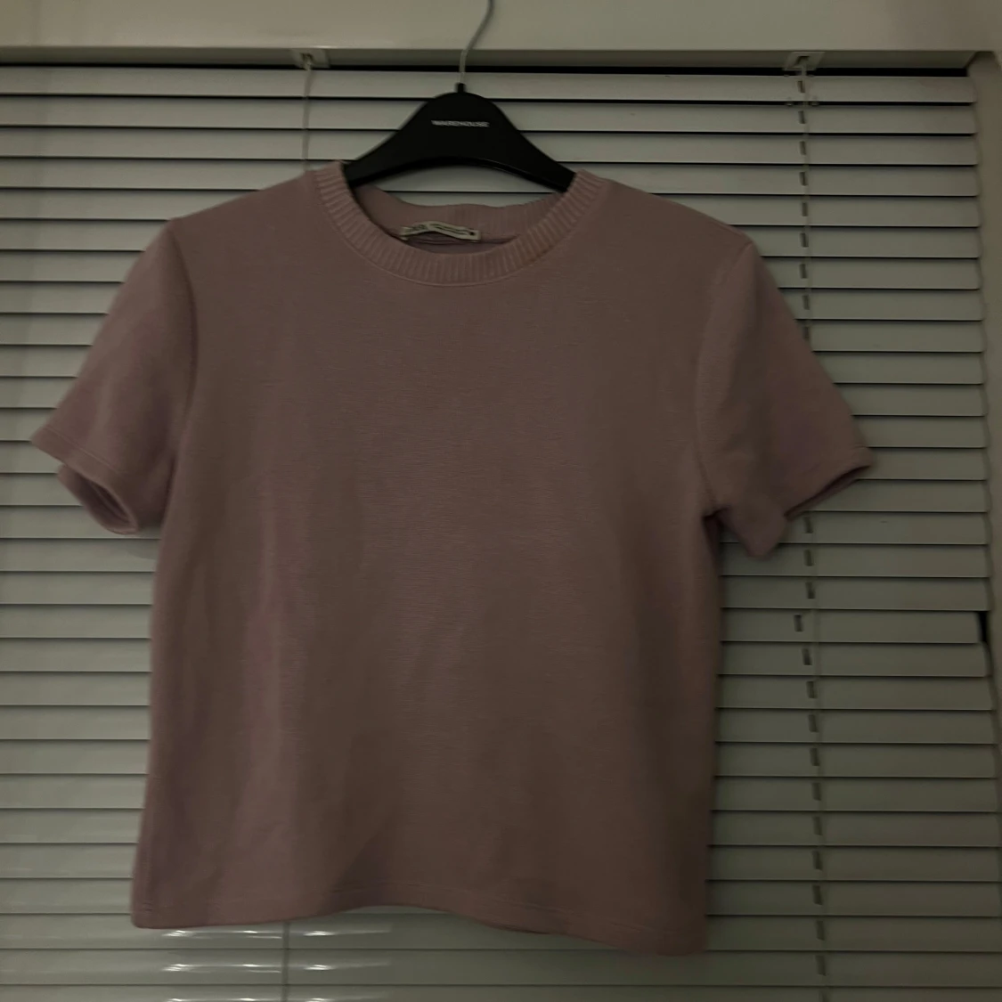 Stickad kortarmad tröja