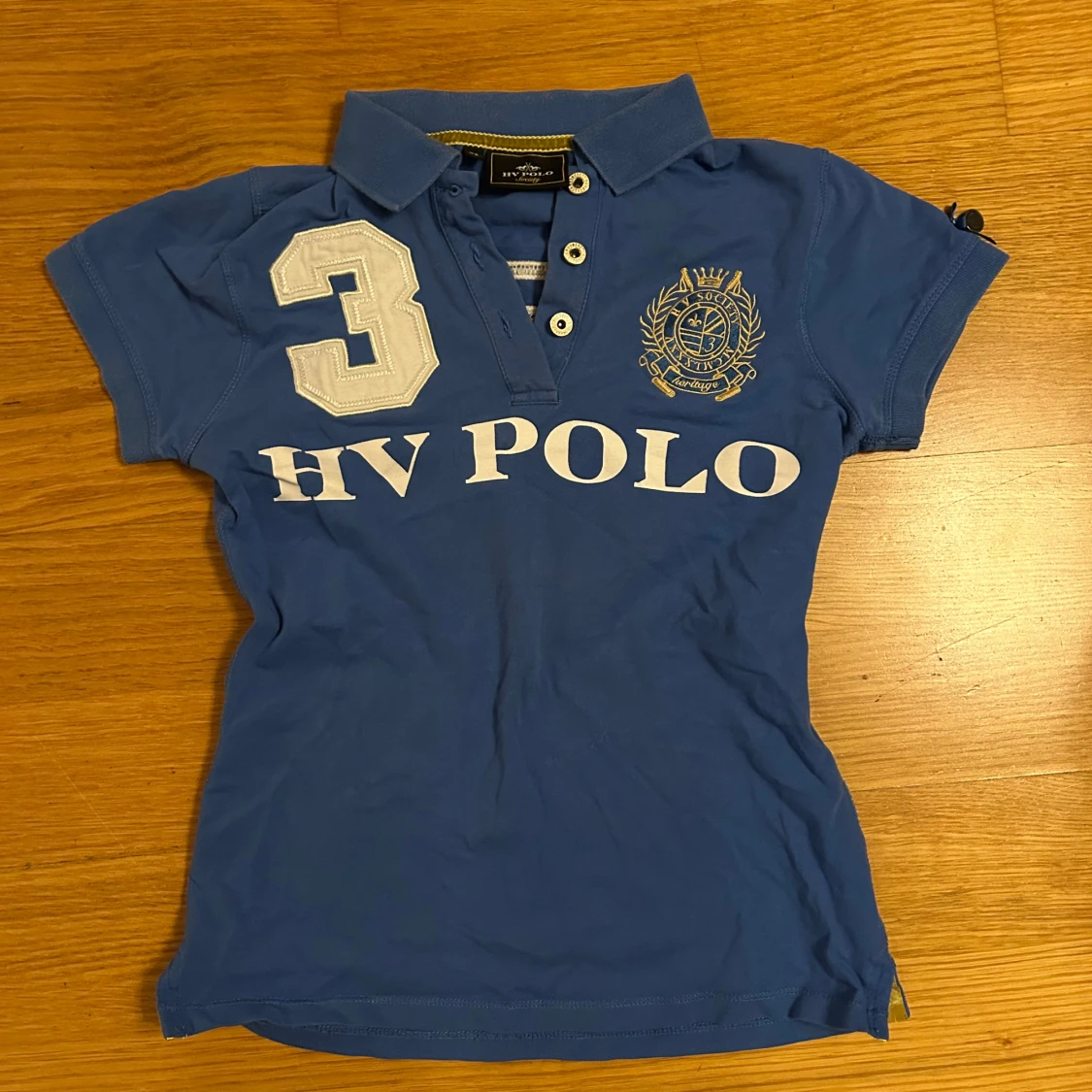Blå pikétröja från HV Polo