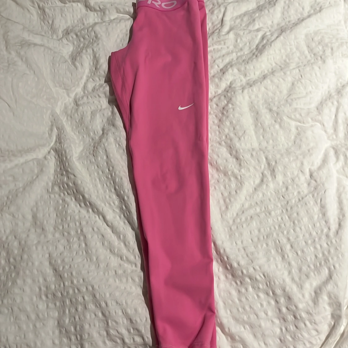 Rosa träningstights från Nike