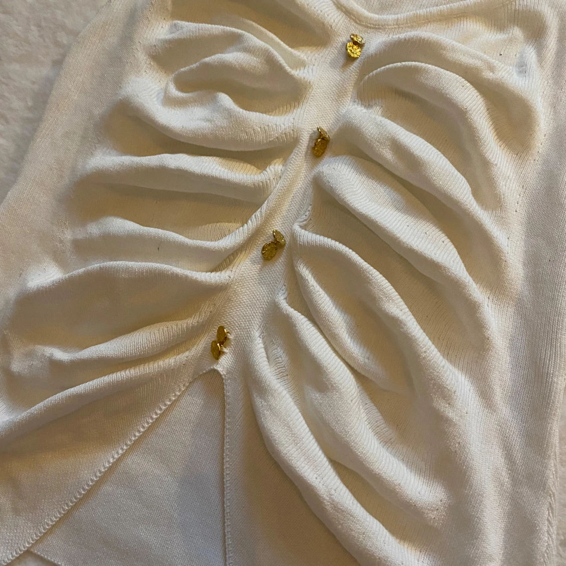 Topp gulddetaljer - 90