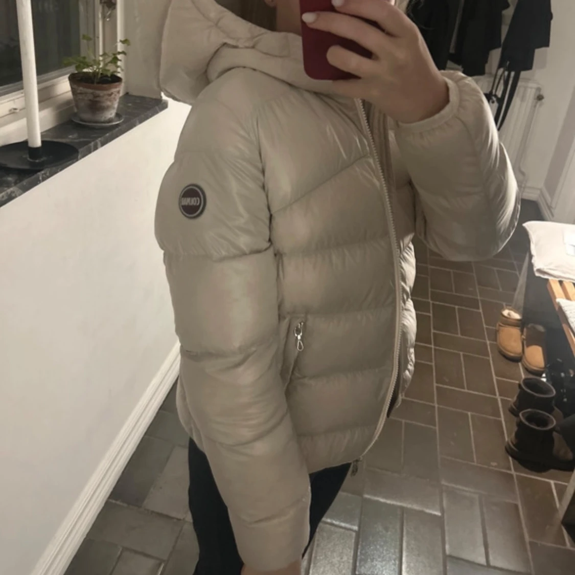 Beige dunjacka från Colmar