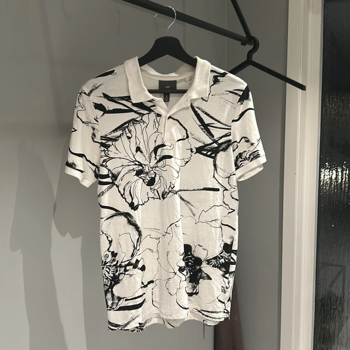 Vit och svart pikétröja från H&M