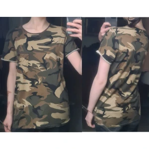 T-shirt camouflagemönstrad militärgrön S - Nykick men gammal, 100% bomull. Vidd: 48, längd: 67. 