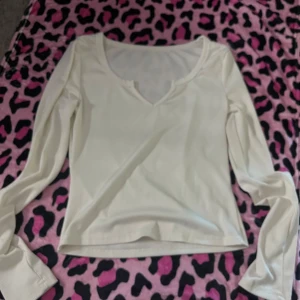 Långärmad topp - Bekväm och lite längre än en vanlig magtröja 