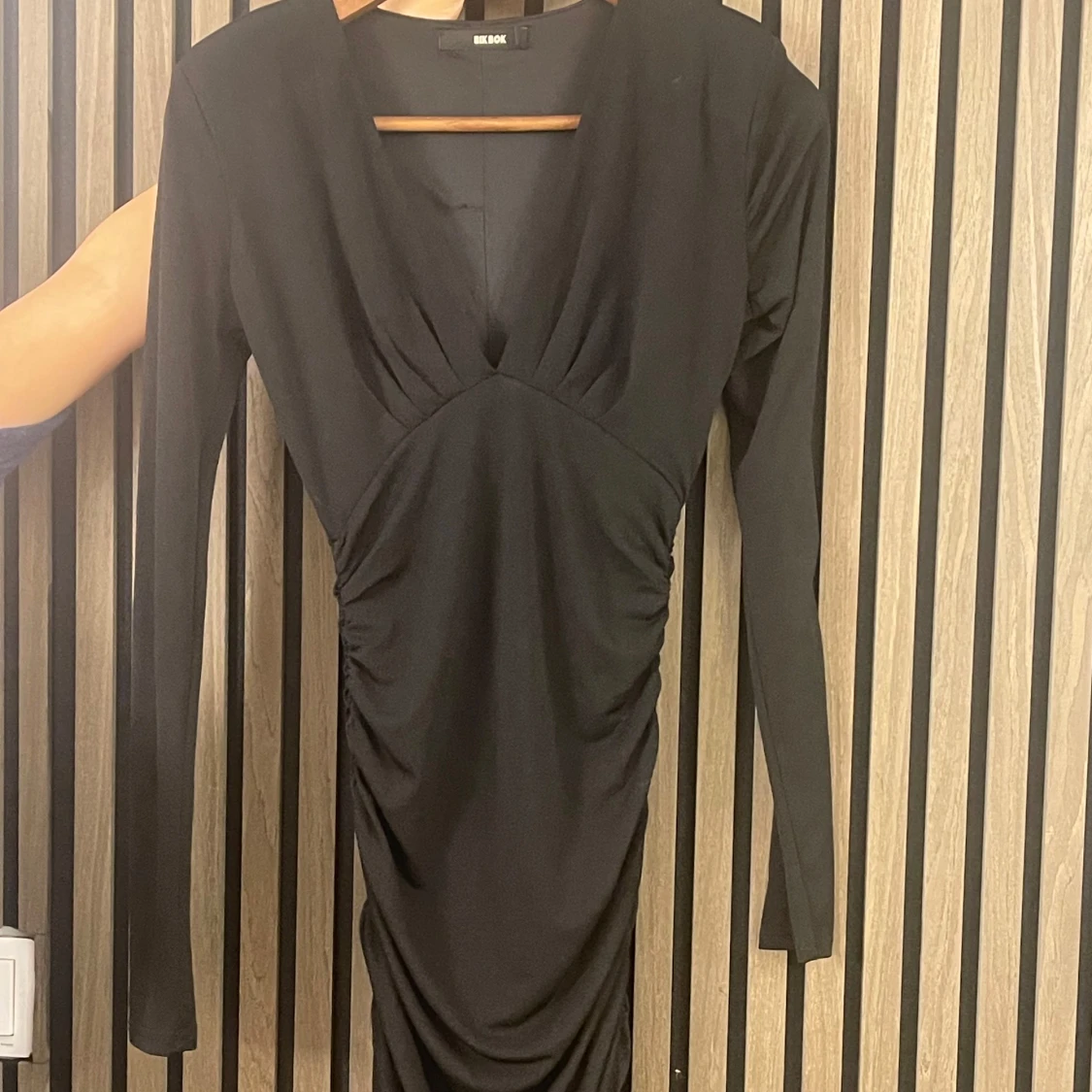 Svart långärmad klänning