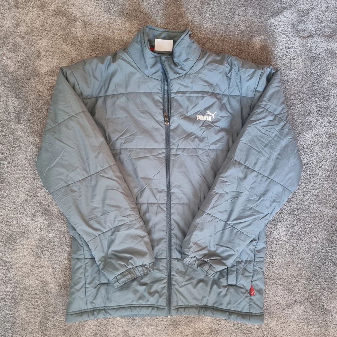 Turkosgrå pufferjacka från Puma