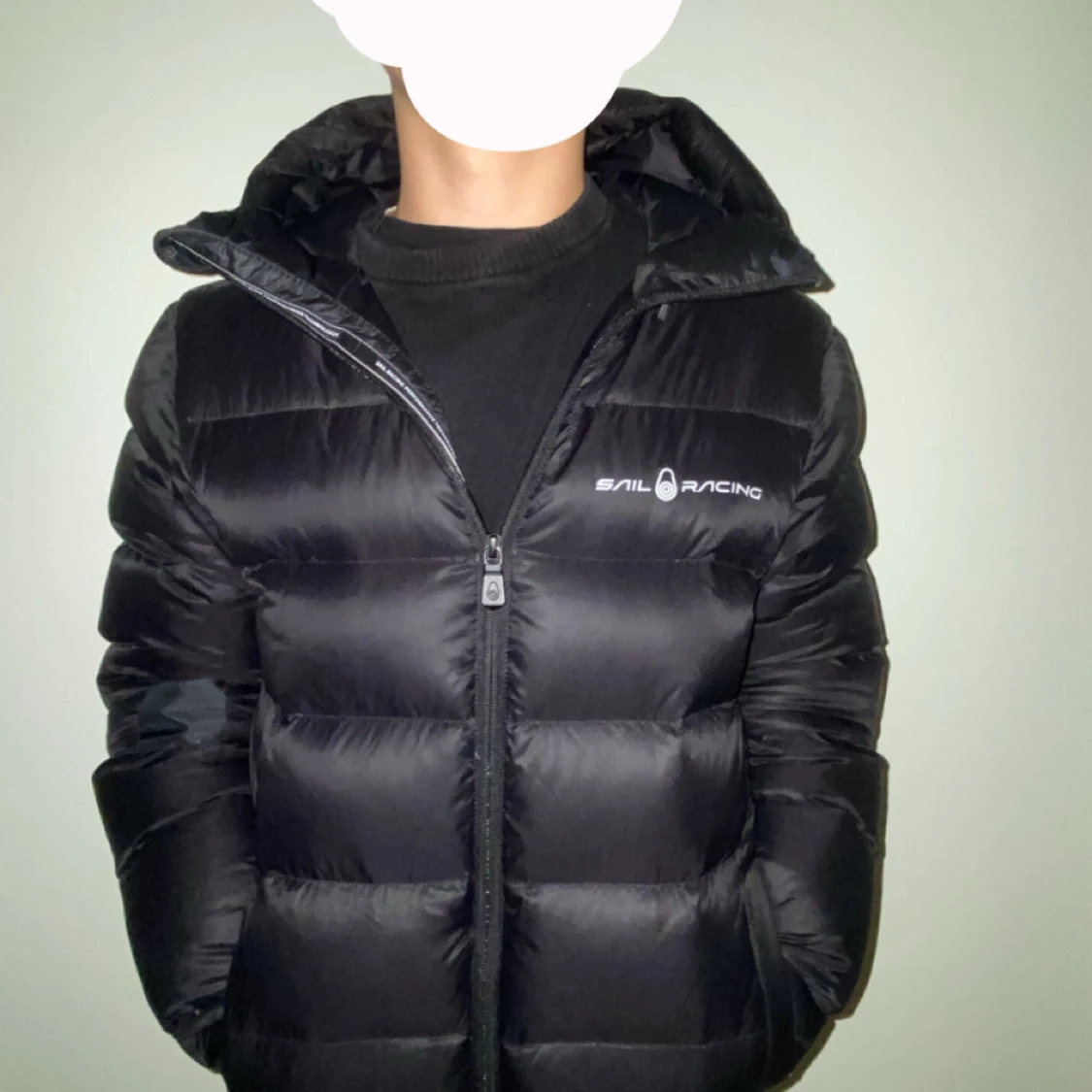 Svart pufferjacka från Sail Racing