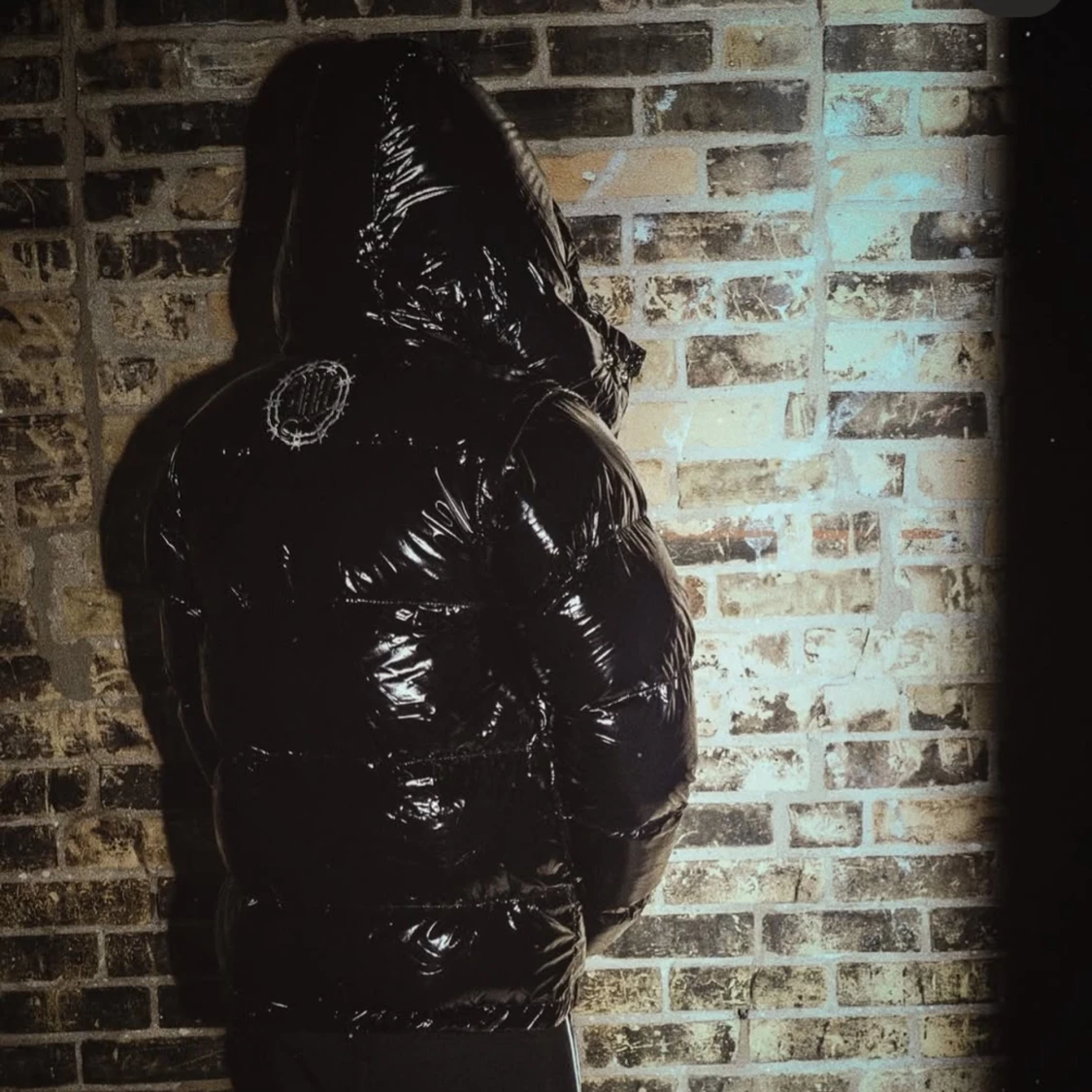 Svart glansig pufferjacka - 91