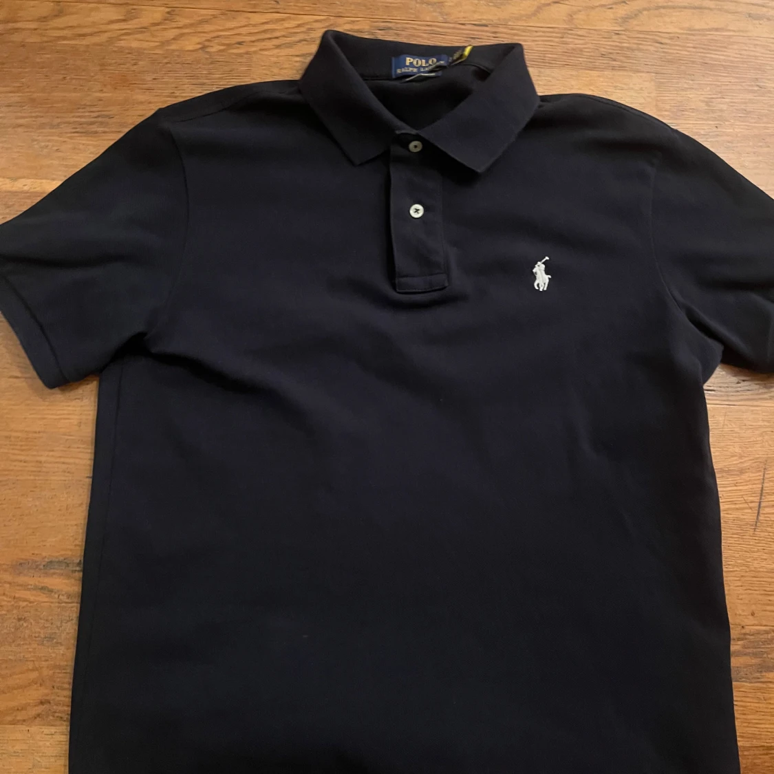 Svart pikétröja från Ralph Lauren