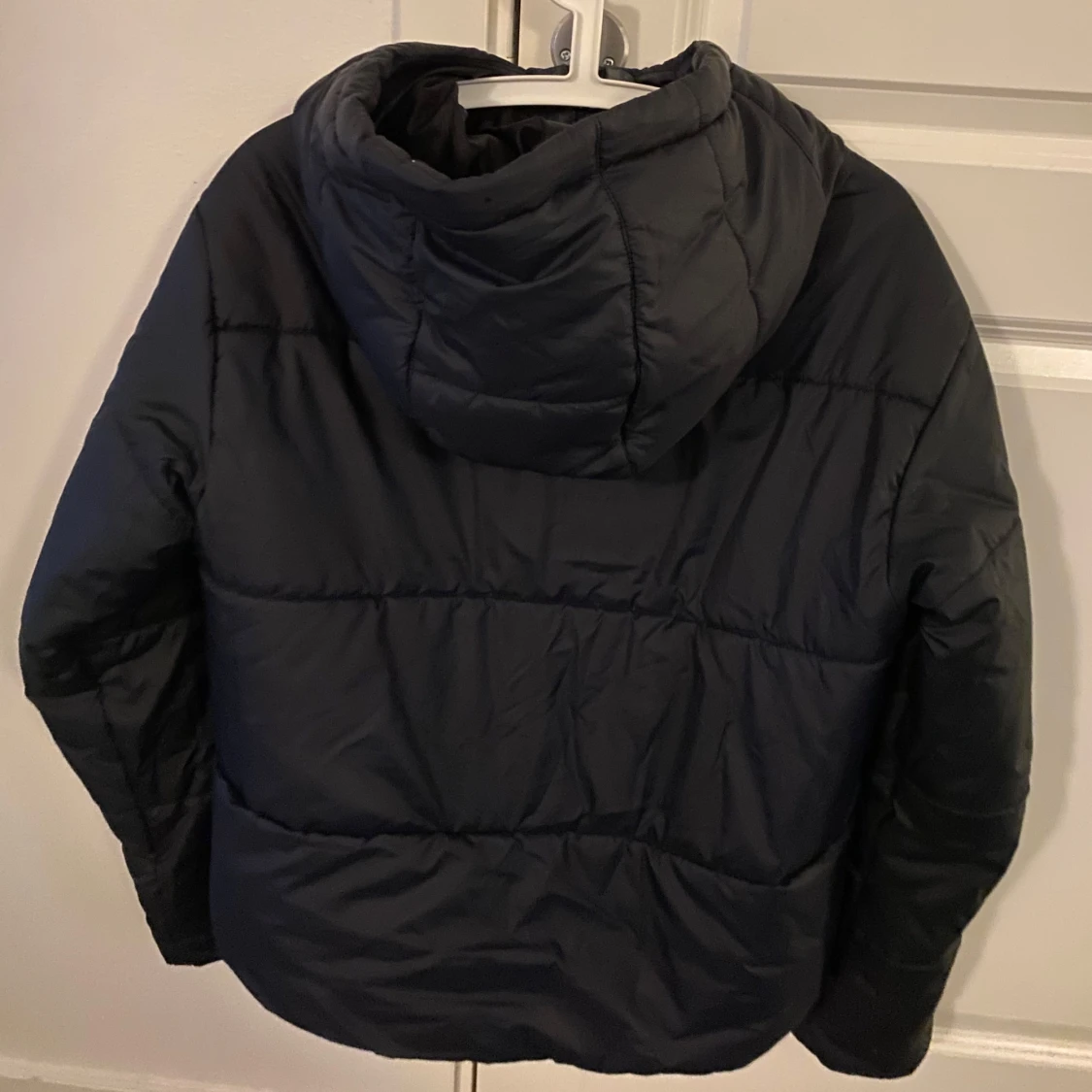 Svart dunjacka från Nike - 92