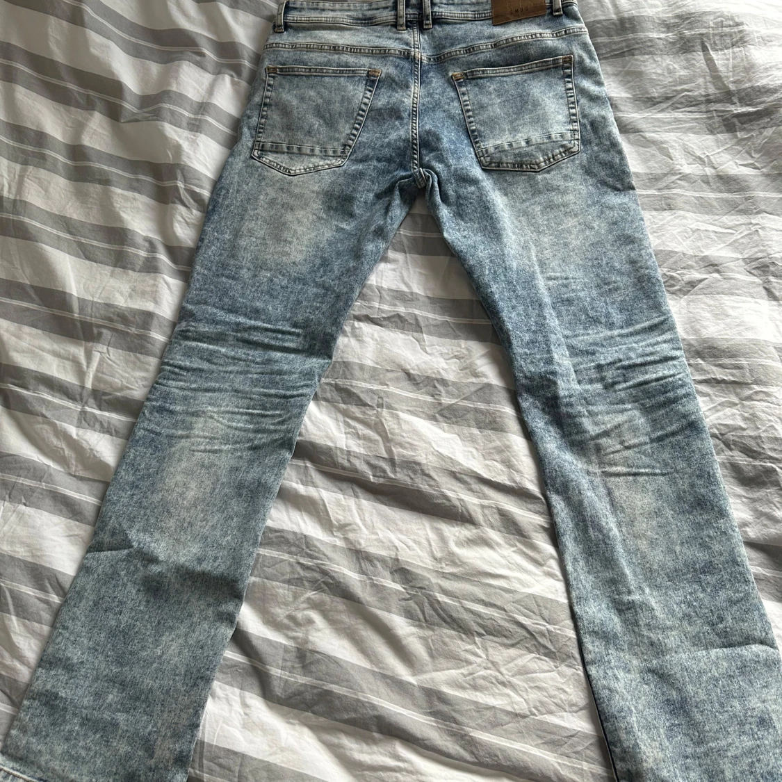 Ljusblå jeans från Smog - 90