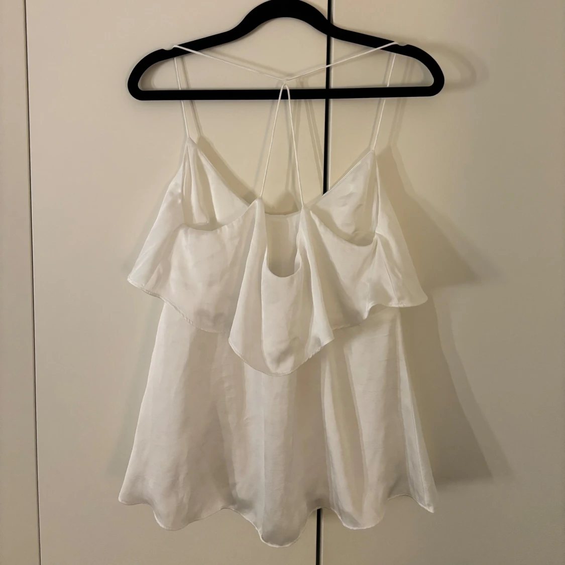 Vit ärmlös topp från Gina Tricot - 90