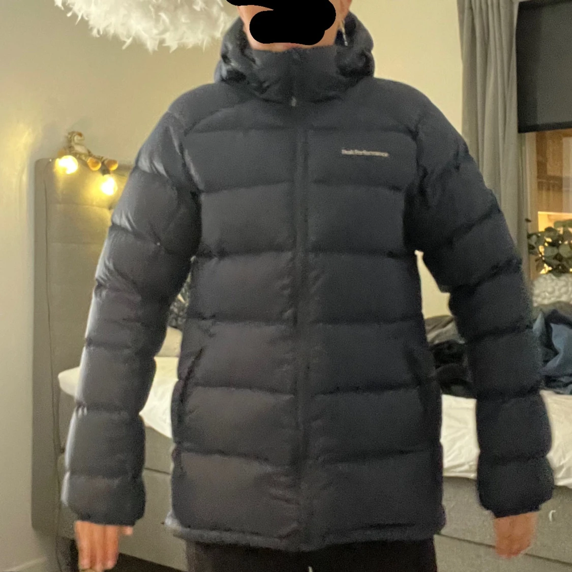 Mörkblå dunjacka från Peak Performance - 90