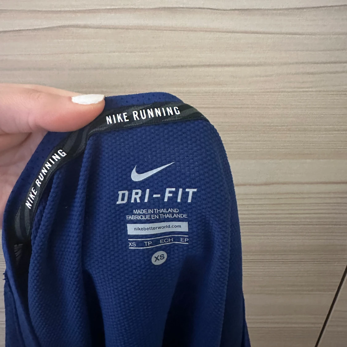 Blå träningstopp från Nike - 90