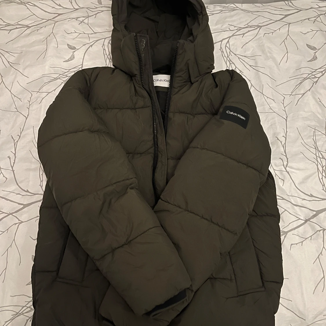 Grön pufferjacka från Calvin Klein - 90