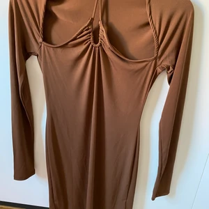 Klänning från NAKD  - Helt ny, storlek M