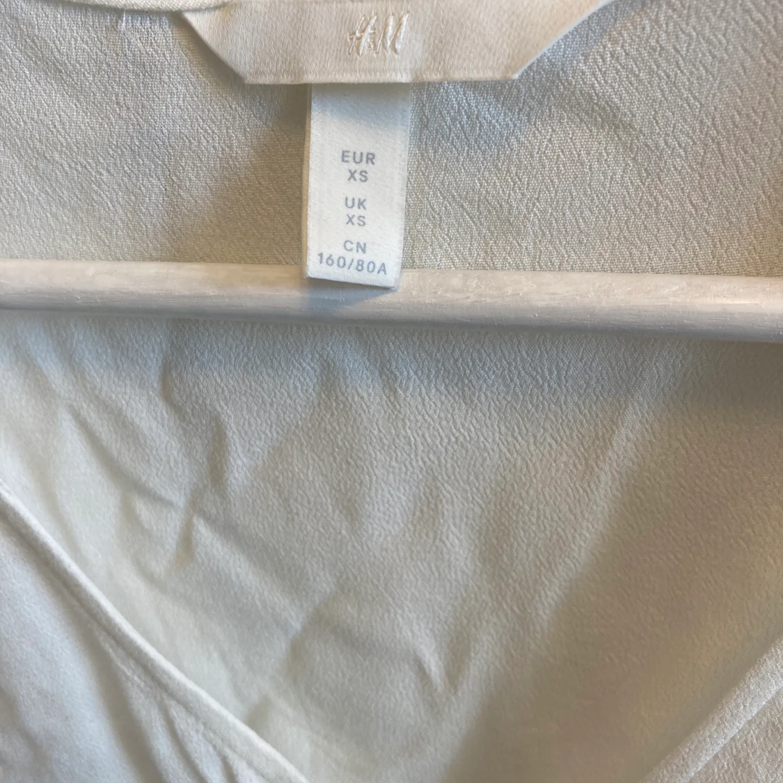 Vit blus i strl XS - 90