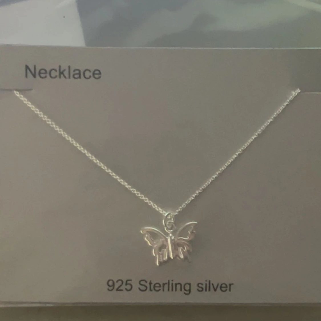 silver butterfly necklace unopened