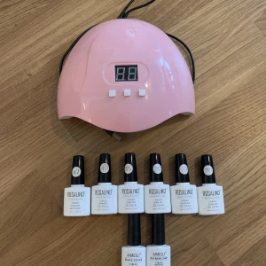 UV-lampa + gellack - Säljer en UV-lampa, gellack i 6 färger samt bas- och topplack.   Allt är köpt från amazon men knappt använt. Därför är samtliga nagellack i princip fulla (fyra färger är helt oanvända). 